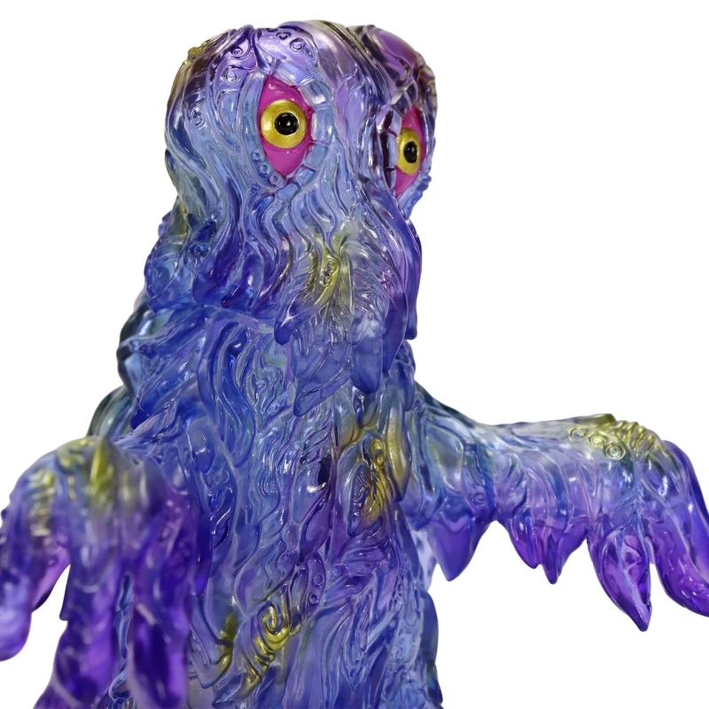 半透明の紫と青のプラスチック製モンスターフィギュア