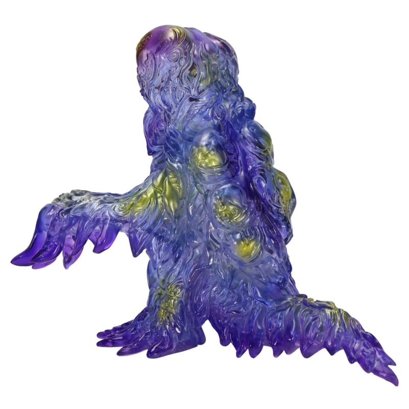 半透明の紫と黄色の怪物フィギュア